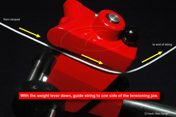 Guiding the string to the tensioning jaw